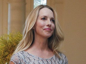 FILE - In this Aug. 2, 2016, file photo, Laurene Powell Jobs arrives for a State Dinner at the White House in Washington. Billionaire executive Laurene Powell Jobs has agreed to buy a 20 percent stake in Ted Leonsis' Monumental Sports & Entertainment. A spokeswoman for Monumental confirmed to The Associated Press that there is an agreement in place with Powell Jobs pending approval from the NBA and NHL. Monumental owns the NBA's Washington Wizards and NHL's Washington Capitals. Powell Jobs, widow of former Apple co-founder and CEO Steve Jobs, is a philanthropist and entrepreneur and is president of the Emerson Collective. (AP Photo/Pablo Martinez Monsivais, File)