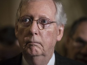 FILE - In this Tuesday, Sept. 26, 2017, file photo, Senate Majority Leader Mitch McConnell, R-Ky., listens to remarks during a news conference at the Capitol in Washington. McConnell said Sunday, Oct. 22, he's willing to bring bipartisan health care legislation to the floor if President Donald Trump makes clear he supports it. (AP Photo/J. Scott Applewhite, File)