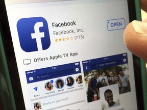 FILE - In this Monday, June 19, 2017, file photo, a user gets ready to launch Facebook on an iPhone, in North Andover, Mass. Facebook's efforts to reduce the spread of fake news using outside fact-checkers may be working, but with a big caveat. The company says once a story receives a "false rating" from a fact-checker, Facebook is able to reduce future impressions of it by 80 percent. But it regularly takes more than three days for a story to receive a false rating. And, the way news stories work, most impressions happen when the story first comes out, not three days later. (AP Photo/Elise Amendola, File)