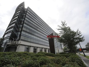 FILE - This Saturday, July 21, 2012, file photo shows the corporate headquarters of Equifax Inc. in Atlanta. Equifax knows a lot about you. That, in essence, is how it makes money. The company and its competitors, Experian and TransUnion, make most of their money selling bulk lists to banks and credit card companies. (AP Photo/Mike Stewart, File)