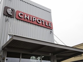 FILE - This Tuesday Dec. 15, 2015, file photo, shows a Chipotle Mexican Grill restaurant in Seattle. Chipotle Mexican Grill, Inc. reports earnings Tuesday, Oct. 24, 2017. (AP Photo/Stephen Brashear, File)
