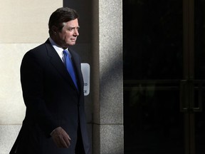 FILE - In this Monday, Oct. 30, 2017, file photo, Paul Manafort walks from Federal District Court in Washington. The three nations named in the indictment of former Trump Campaign Chairman Paul Manafort have been known by financial crime experts in the past as locations for money laundering or at risk of being used for money laundering. (AP Photo/Alex Brandon, File)