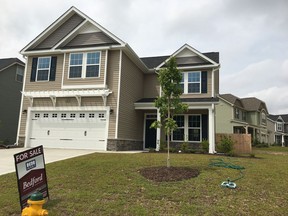 This Wednesday, Sept. 6, 2017, photo shows a new home for sale in a housing development in Raeford, N.C. On Wednesday, Oct. 25, 2017, the  Commerce Department reports on sales of new homes in September. (AP Photo/Swayne B. Hall)