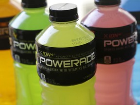 FILE - In this Monday, May 5, 2014, file photo, various flavors of Powerade, a Coca-Cola brand, are photographed in San Francisco. The Coca-Cola Co. reports earnings Wednesday, Oct. 25, 2017. (AP Photo/Jeff Chiu, File)