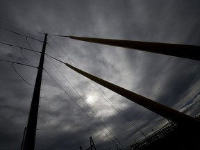 FILE - In this Nov. 12, 2015, file photo, a concrete pole carrying feeder lines stands outside an electric company substation in the U.S. Hackers likely linked to the North Korean government targeted U.S. electricity grid workers in September 2017, according to a security firm that says it detected and stopped the attacks, which didn't threaten any critical infrastructure. But the attempted breaches raise concerns. (AP Photo/Gerald Herbert, File)