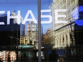 This Monday, Jan. 11, 2016, photo shows a Chase bank branch in New York. JPMorgan Chase & Co. reports earnings Thursday, Oct. 12, 2017. (AP Photo/Mark Lennihan)