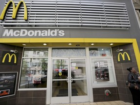 This Monday, April 24, 2017, photo shows a McDonald's restaurant in downtown Pittsburgh. McDonald's Corp. reports earnings Tuesday, Oct. 24, 2017. (AP Photo/Keith Srakocic)