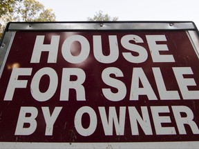 This Tuesday, Oct. 17, 2017, photo shows a "House for Sale by Owner" sign in a yard in Fort Washington, Pa. On Friday, Oct. 20, 2017, the National Association of Realtors reports on sales of existing homes in September. (AP Photo/Matt Rourke)