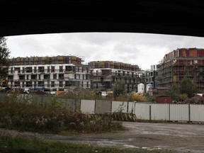 In this picture taken Tuesday, Oct. 3, 2017, new apartment buildings are being constructed in Prague, Czech Republic. The Czech Republic's capital has the hottest residential property market in Europe, and it's becoming a problem.  (AP Photo/Petr David Josek)