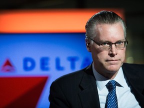 Edward "Ed" Bastian, president of Delta Air Lines Inc., poses for a photograph ahead of a Bloomberg Television interview on the sidelines of the Singapore Airshow in Singapore, on Tuesday, Feb. 11, 2014.