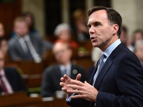 Minister of Finance Bill Morneau stands during question period in the House of Commons on Parliament Hill in Ottawa on Monday, Oct. 23, 2017. THE CANADIAN PRESS/Sean Kilpatrick