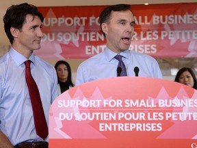 Finance Minister Bill Morneau with Prime Minister Justin Trudeau at a press conference on tax reforms in Stouffville, Ont., on Monday.