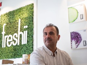 Beeru Mannan, who owns and operates two Freshii restaurants with his brother and is in the process of opening two more, poses for a photograph in Burnaby, B.C., on Monday October 9, 2017. THE CANADIAN PRESS/Darryl Dyck