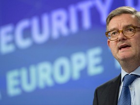 European Commissioner for Security Julian King speaks during a media conference at EU headquarters in Brussels on Wednesday, Oct. 18, 2017. European security commissioner, Julian King, unveiled new measures on Wednesday to protect against lone-wolf attacks following a spate of killings in Europe's capitals. (AP Photo/Virginia Mayo)