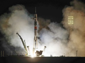 FILE- In this file photo taken on Wednesday, Sept. 13, 2017, The Soyuz-FG rocket booster with Soyuz MS-06 space ship carrying a new crew to the International Space Station, ISS, blasts off at the Russian leased Baikonur cosmodrome, Kazakhstan. Six decades after Sputnik opened the space era, Russia has struggled to build up on its Soviet-era space achievements and space research now ranks very low among the Kremlin's priorities. (AP Photo/Dmitri Lovetsky, File)