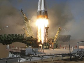 In this photo distributed by Roscosmos Space Agency Press Service, Russian cargo ship Souz 2,1A launches from Russia's main space facility in Baikonur, Kazakhstan, Saturday, Oct. 14, 2017. A Russian cargo ship has been launched to take supplies to the six astronauts aboard the International Space Station. (Roscosmos Space Agency Press Service photo via AP)