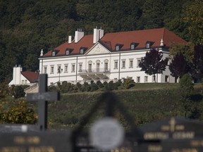 View from a nearby cemetery of the residence of Ivica Todoric, founder of the Croatia's biggest private company, in Zagreb, Monday, Oct. 16, 2017. Croatian police on Monday raided the homes of Todoric and his former aides amid an ongoing investigation over the retail giant's financial collapse. (AP Photo/Darko Bandic)