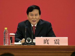 Tuo Zhen, spokesperson for the 19th National Congress of the Communist Party of China speaks during a press conference at the Great Hall of the People in Beijing, China, Tuesday, Oct. 17, 2017. Communists party leaders from across the country have gathered in the Chinese capital for the five yearly Party Congress where Chinese President Xi Jinping is expected to get a second term as party leader. (AP Photo/Ng Han Guan)