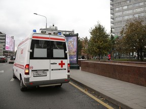 An ambulance leaves the Ekho Moskvy (Echo of Moscow) radio station office in Moscow, Russia, Monday, Oct. 23, 2017. Russia's Ekho Moskvy news radio station said on its website Monday that an assailant burst into its studios and stabbed Tatyana Felgenhauer who is best known for co-hosting a popular morning show .(AP Photo/Alexander Zemlianichenko)