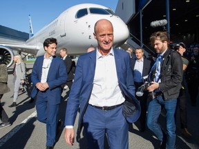 Airbus CEO Tom Enders walks away from a Bombardier CSeries jet during a visit to Bombardier's Mirabel plant in Mirabel, Quebec, Friday, October 20, 2017.
