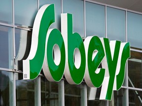 Sobeys says it is cutting 800 office jobs across Canada as part of a reorganization of its grocery business.