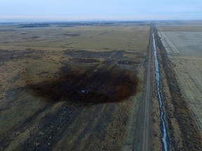 This aerial photo shows spills from TransCanada Corp.'s Keystone pipeline, Friday, Nov. 17, 2017, that leaked an estimated 210,000 gallons of oil onto agricultural land in northeastern South Dakota, near Amherst, S.D.