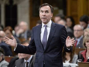 Minister of Finance Bill Morneau responds to a question during Question Period in the House of Commons Wednesday, November 29, 2017 in Ottawa.