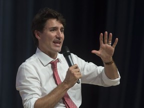 Canadian Prime Minister Justin Trudeau speaks to students at the Ton Duc Thang University in Ho Chi Minh, Vietnam Thursday November 9, 2017. Trudeau is expanding on his concerns about the Trans-Pacific Partnership as more details emerge about why his government might avoid locking itself into the agreement when the treaty's partners meet this week in Vietnam. THE CANADIAN PRESS/Adrian Wyld