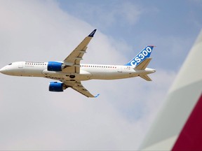 The Bombardier CS300 performs its demonstration flight at the Paris Air Show in Le Bourget, north of Paris, Wednesday June 17, 2015. Bombardier Inc. has signed a letter of intent to sell up to 24 CS300 aircraft to EgyptAir Holding Co. THE CANADIAN PRESS/AP-Remy de la Mauviniere