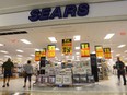 Shoppers are seen in a Sears store in Hull, Quebec on Friday, July 21, 2017. The Competition Bureau is investigating allegations that prices on some merchandise was marked up ahead of the liquidation sales at Sears Canada that began last month, the court-appointed monitor overseeing the retailer says.