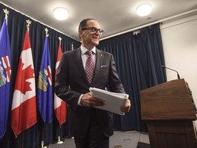 Alberta Finance Minister Joe Ceci leaves after speaking about the Government of Alberta's 2016-17 year-end financial results, in Edmonton on Thursday, June 29, 2017. Alberta remains on a path to rack up a $10.3 billion deficit this year but Ceci says the signs suggest a continued rebound in the economy. THE CANADIAN PRESS/Jason Franson