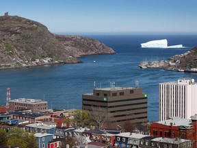 An iceberg is seen just outside of the Narrows of St. John's Harbour on Friday, June 13, 2014. Newfoundland and Labrador is forecasting a deficit of $852 million this fiscal year, up from $778 million predicted in last April's budget. THE CANADIAN PRESS/Paul Daly