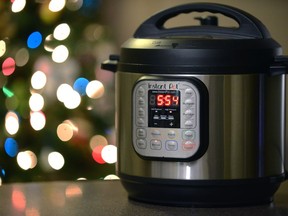 The malls are decked with boughs of holly as retailers hope to attract shoppers during the key holiday season. But more and more Canadians are hoping to score the best deals from the comfort of their own homes and a digital screen. An Instant Pot programmable pressure cooker is shown in Toronto on Thursday, Nov. 30, 2017.