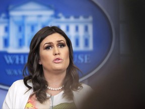 White House press secretary Sarah Huckabee Sanders talks to reporters during a press briefing in the Brady Press Briefing Room at the White House, in Washington, Monday, Nov. 27, 2017. (AP Photo/Manuel Balce Ceneta)