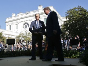 President Donald Trump, right, and Federal Reserve board member Jerome Powell, left, walk away from the podium after Trump announced Powell as his nominee for the next chair of the Federal Reserve in the Rose Garden of the White House in Washington, Thursday, Nov. 2, 2017. (AP Photo/Pablo Martinez Monsivais)