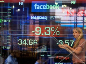 Facebook stock is seen on the Nasdaq MarketSite tumbling well below its IPO price on the second day of trading on May 21, 2012.