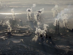 FILE - In this Jan. 9, 2009 file photo smoke rises from the steel company ThyssenKrupp in Duisburg , western Germany. Levels of carbon dioxide in the atmosphere have steadily increased since the days of the industrial revolution, contributing to the greenhouse effect that is spurring global warming.  (AP Photo/Frank Augstein, file)