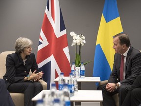 Britain's Prime Minister Theresa May, left, meets with her Swedish counterpart Stefan Lofven at Hotel Gothia Tower in Gothenburg, Sweden, Thursday, Nov. 16, 2017, on the eve of the EU Social Summit for Fair Jobs and Growth. (Bjorn Larsson Rosvall/TT News Agency via AP)