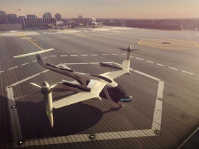 This computer generated image provided by Uber Technologies on Wednesday, Nov. 8, 2017 shows a flying taxi by Uber. Commuters of the future could get some relief from congested roads if Uber's plans for flying taxis work out. The ride-hailing service has unveiled an artist's impression of the sleek, futuristic machine it hopes to start using for demonstration flights in 2020 and deploy for ride-sharing by 2028. (Uber Technologies via AP)