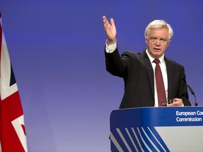 FILE- In this Thursday, Aug. 31, 2017 file photo, British Secretary of State for Exiting the European Union David Davis speaks during a media conference at EU headquarters in Brussels. Britain is promising European Union citizens the right to appeal if they are denied permission to live in the U.K. after Brexit, it was reported Tuesday, Nov. 7, 2017. (AP Photo/Virginia Mayo, File)