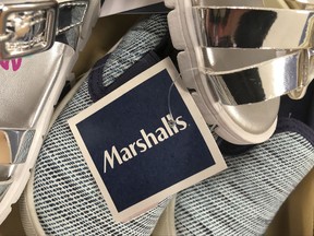 In this Tuesday, May 16, 2017, photo, a Marshalls tag is attached to merchandise in a store in Methuen, Mass. On Wednesday, Nov. 15, 2017, the Commerce Department reports on business stockpiles in September. (AP Photo/Elise Amendola)