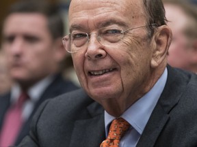 FILE - In this Thursday, Oct. 12, 2017, file photo, Commerce Secretary Wilbur Ross appears before the House Committee on Oversight and Government Reform to discuss preparing for the 2020 Census, on Capitol Hill in Washington. Newly leaked documents show that Ross has a stake in a shipping company that does business with a gas producer partly owned by the son-in-law of Russian President Vladimir Putin, according to the International Consortium of Journalists. (AP Photo/J. Scott Applewhite, File)