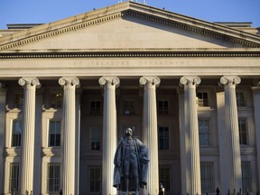 FILE - This Thursday, June 8, 2017, file photo shows the U.S. Treasury Department building in Washington. On Monday, Nov. 13, 2017, the Treasury Department releases federal budget data for October. (AP Photo/Pablo Martinez Monsivais, File)