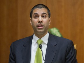 FILE - In this Feb. 26, 2015, file photo, Federal Communication Commission Commissioner Ajit Pai speaks during an open hearing and vote on "Net Neutrality" in Washington. Federal Communications Commission Chairman Ajit Pai is following through on his pledge to repeal 2015 regulations designed to ensure that internet service providers treat all online content and apps equally. Pai distributed his alternative plan to the net neutrality rules to other FCC commissioners Tuesday, Nov. 21, 2017, in preparation for a Dec. 14 vote on the proposal. (AP Photo/Pablo Martinez Monsivais, File)