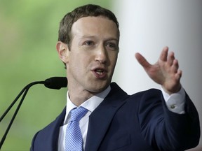 FILE - In this May 25, 2017, file photo, Facebook CEO Mark Zuckerberg delivers the commencement address at Harvard University in Cambridge, Mass. Zuckerberg says his biggest takeaway of his year traveling to dozens of states is the importance of local communities. To this end, he's announcing a new program to boost small businesses and give people technical skills on and off Facebook. The move shows how intertwined Facebook has become not just in our social lives, but in entrepreneurs' economic survival and growth. (AP Photo/Steven Senne, File)