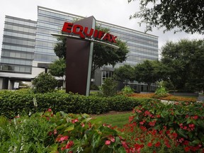 This Saturday, July 21, 2012, photo shows the headquarters of Equifax Inc., in Atlanta. Equifax expects the financial impact from a massive data breach earlier in 2017 to linger and weigh down fourth-quarter results. (AP Photo/Mike Stewart)