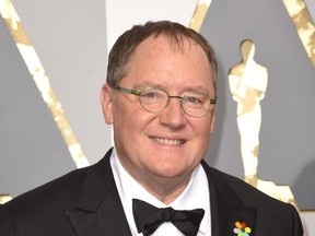 FILE - In this Feb. 28, 2016 file photo, Pixar co-founder and Walt Disney Animation chief John Lasseter arrives at the Oscars in Los Angeles. Lasseter is taking a six-month leave of absence citing "missteps" with employees. (Photo by Dan Steinberg/Invision/AP, File)