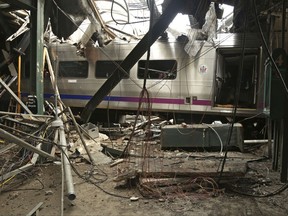 FILE – This Oct. 1, 2016, file photo provided by the National Transportation Safety Board shows damage from a Sept. 29, 2016, commuter train crash that killed a woman and injured more than 100 people at the Hoboken Terminal in Hoboken, N.J. More than 40 New Jersey Transit train engineers have been sidelined because testing imposed after a deadly rail crash found they suffered from sleep apnea, Wednesday, Nov. 8, 2017. (Chris O'Neil/National Transportation Safety Board via AP, File)