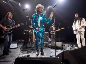 The Tragically Hip perform on their farewell tour in 2016. Frontman Gord Downie, centre, died last month after battling brain cancer.