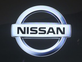 In this Oct. 25, 2017, photo, Nissan Motor Co. logo is displayed at the Tokyo Auto show in Tokyo. Japanese automaker Nissan Motor Co. is seeing fiscal second-quarter profit slip 3 percent despite growing sales because of costs related to improper vehicle checks in Japan and a massive global air-bag recall in the U.S.  Nissan, allied with Renault SA of France, reported Wednesday, Nov. 8, 2017,  a July-September profit of 141.6 billion yen ($1.2 billion), down from 146.1 billion yen the same period last year.(AP Photo/Koji Sasahara)